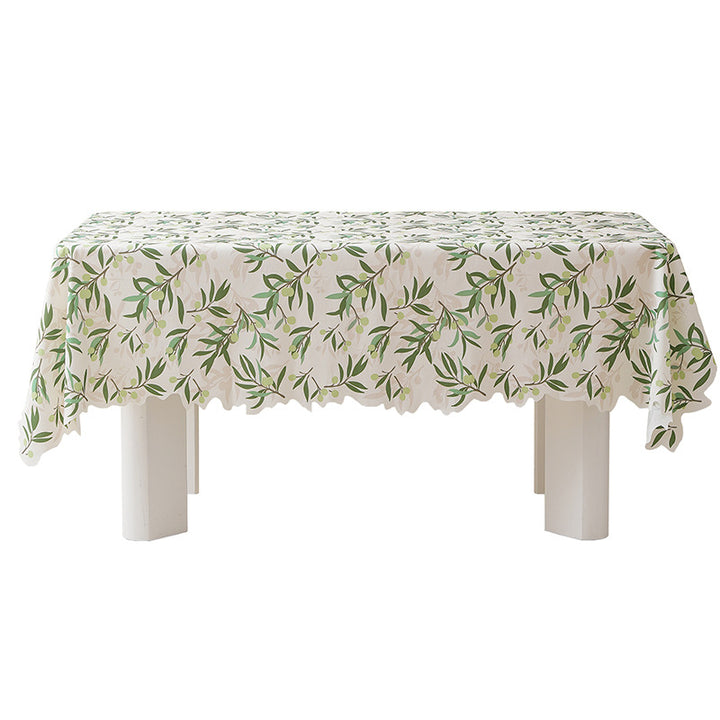 Round wipeable tablecloth with floral cut-out hem