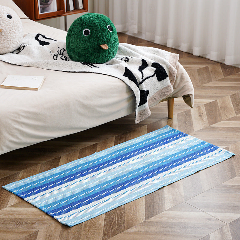 Flat-woven runner rug with check pattern and decorative border stripe