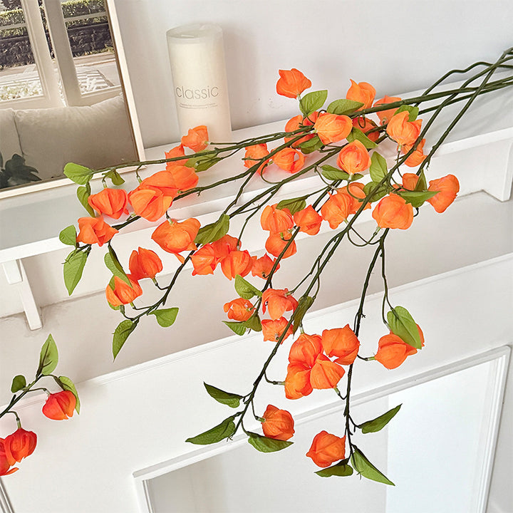 Artificial flower branch with fine, vibrant flowers and natural look