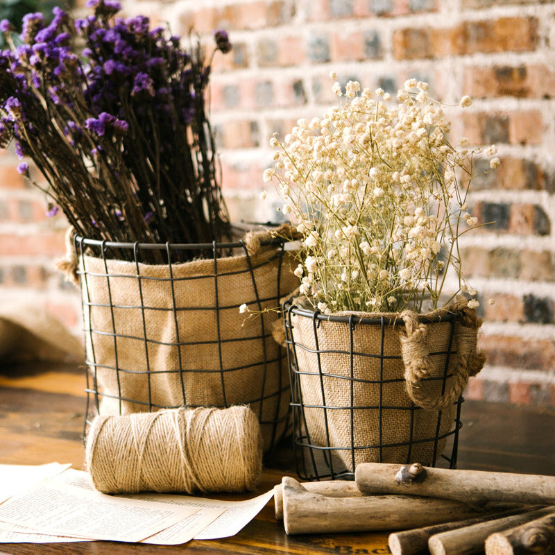 Decorative storage basket made of wire and linen