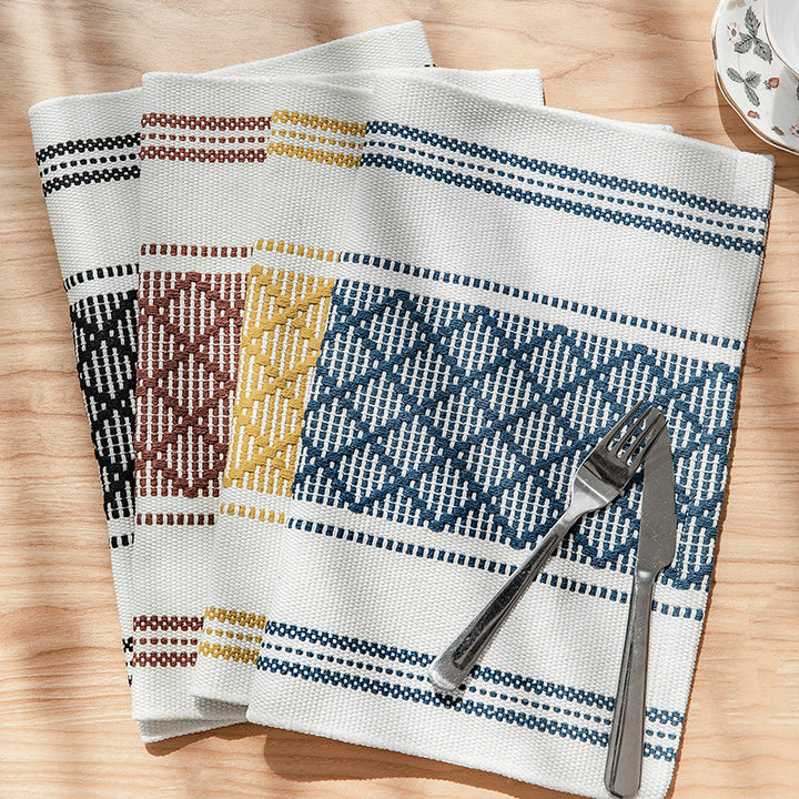 Flat woven placemat with woven diamond jacquard pattern