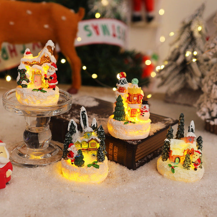 Christmas miniature lighting with snow scenes