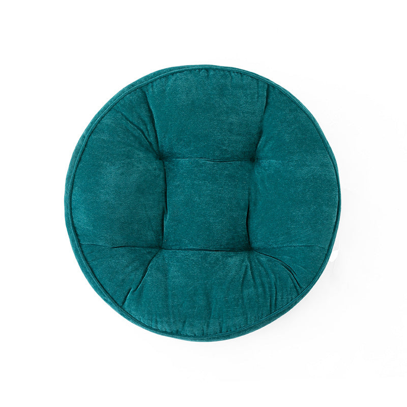 Round padded seat cushion with tufting and soft microfiber cover