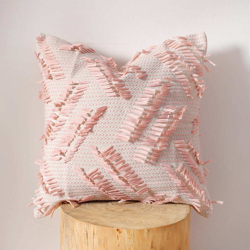 Decorative pillow with woven chenille relief structure and fringe application