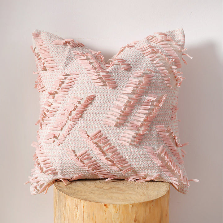 Decorative pillow with woven chenille relief structure and fringe application