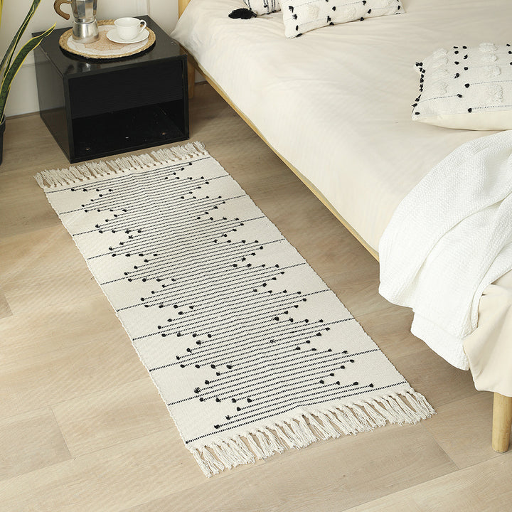 Cotton runner rug with fringes and geometric texture pattern
