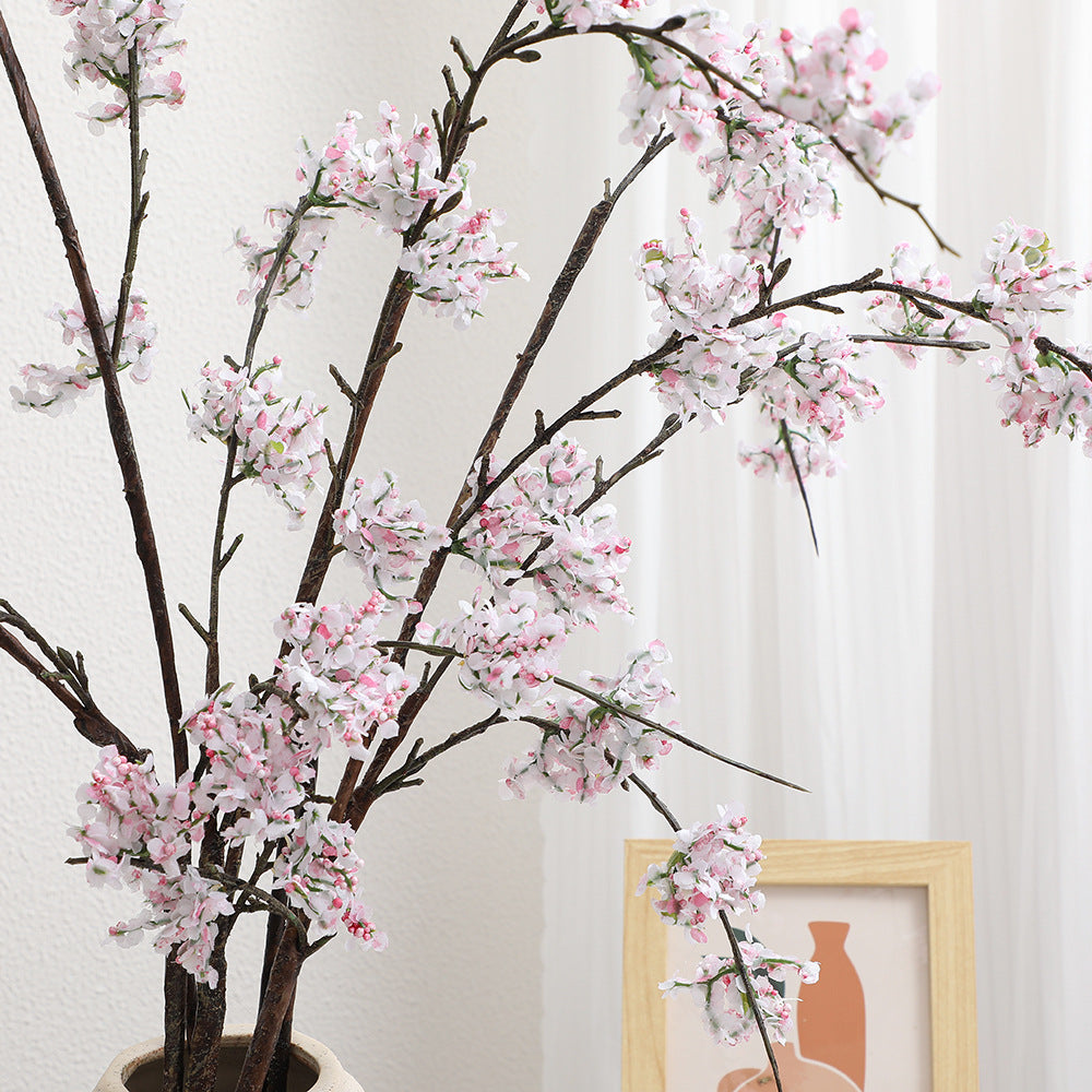Artificial cherry blossom branch with lifelike details