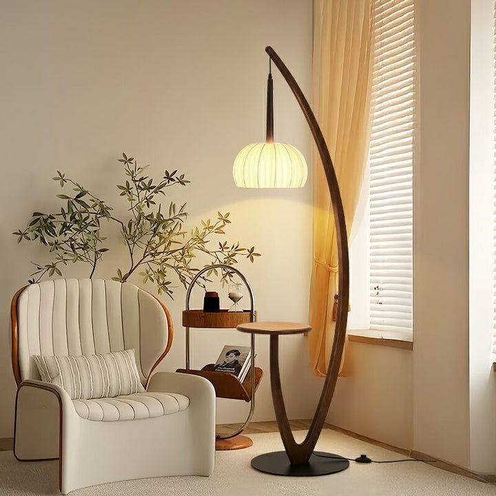 Artistic curved floor lamp with integrated side table