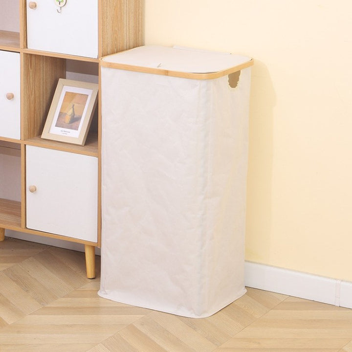 Stylish laundry basket with wooden lid