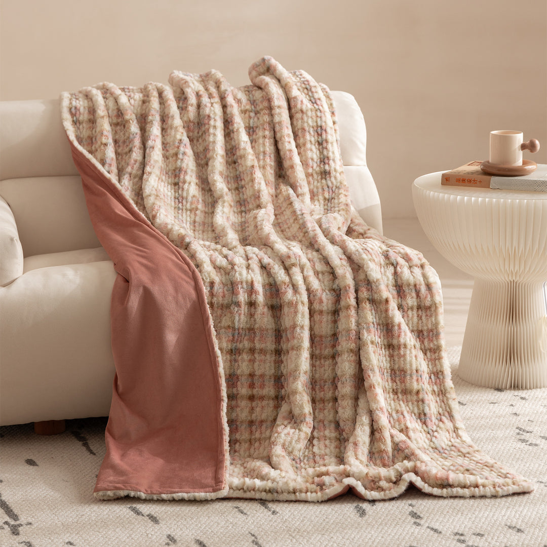 Cozy blanket made of luxurious synthetic fur with wavy texture and soft microfiber back