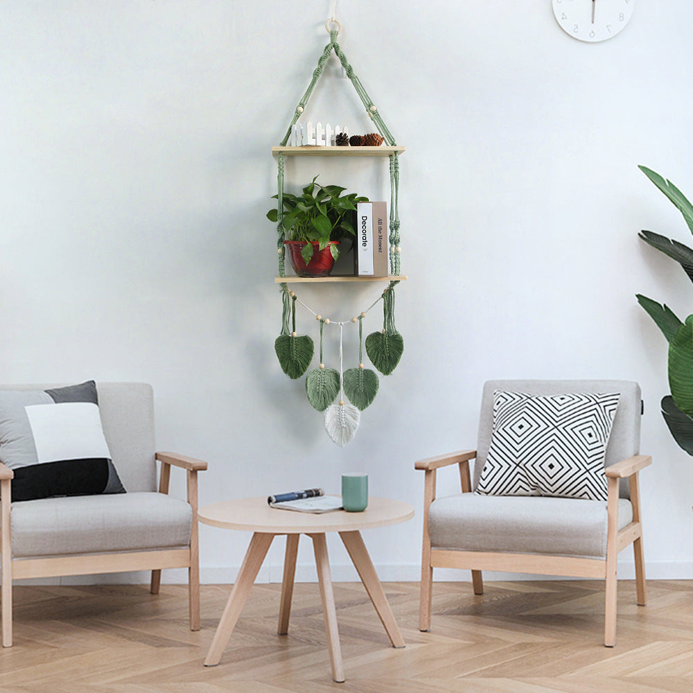 Macramé plant shelf with artistic leaf design