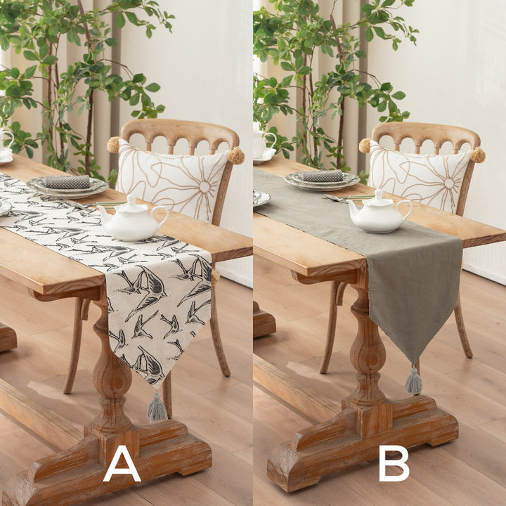 Woven double-sided linen table runner with tassels and hand-drawn swallow print