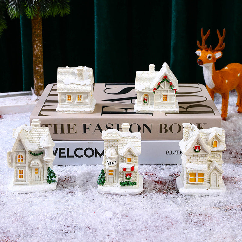 Illuminated Christmas village house with festive decoration