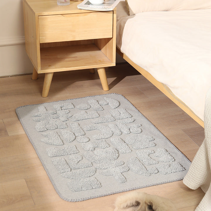 Luxurious organic cotton bath mat with relief pile structure