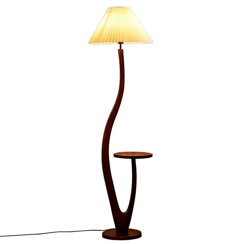 Artistic sculptural floor lamp with integrated side table