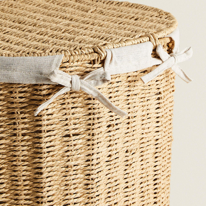Round laundry basket made of natural materials