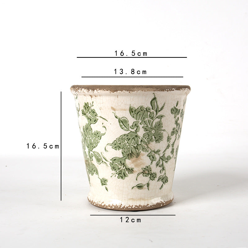 Decorative ceramic flower pot with floral design