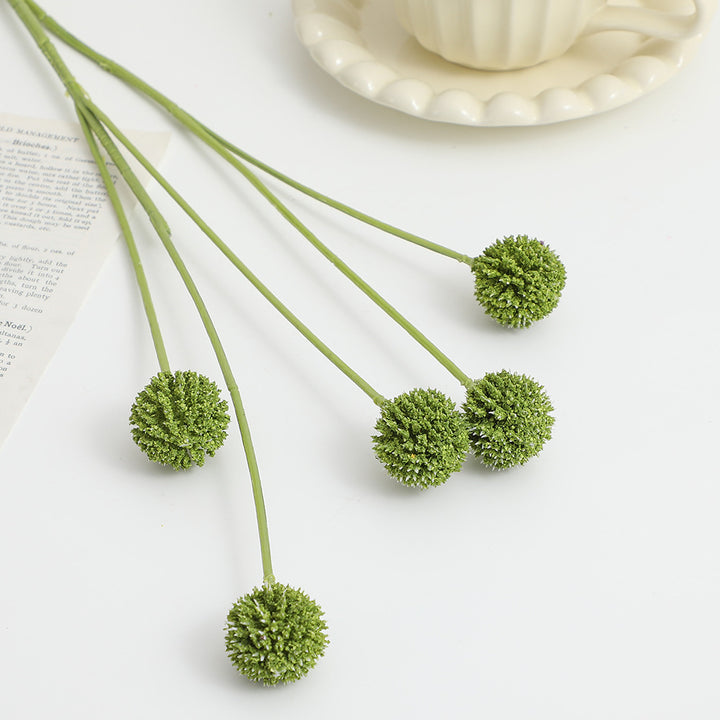 Artificial flower stem with detailed blooms