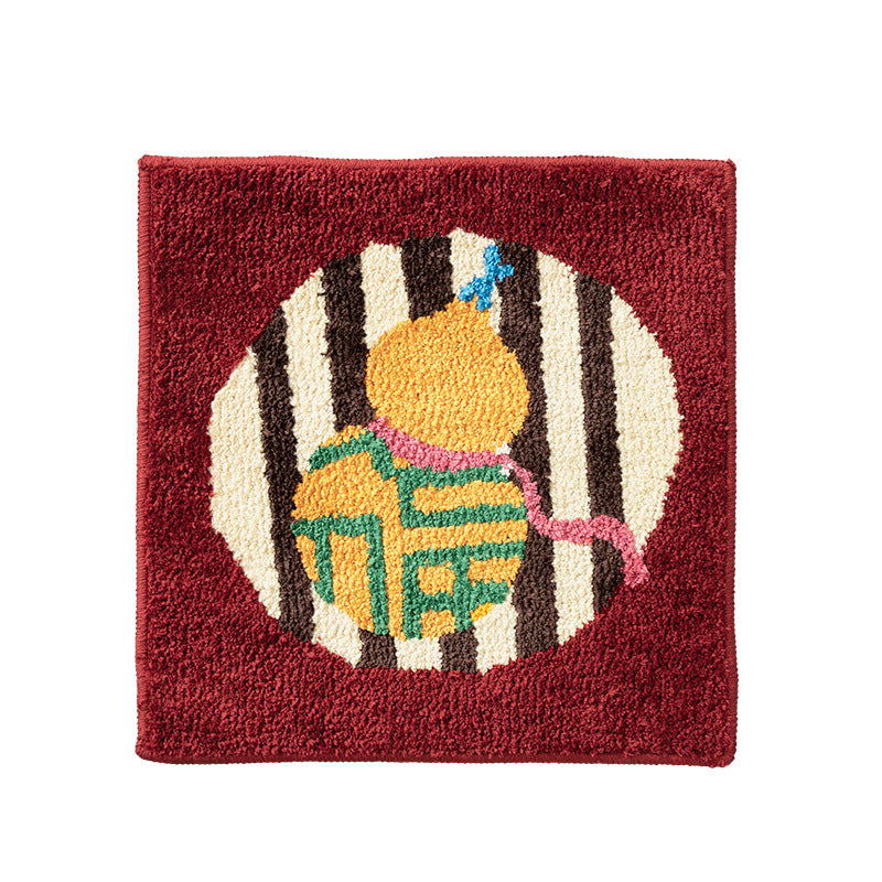 Hand-tufted square decor bath mat with animal motif and non-slip back