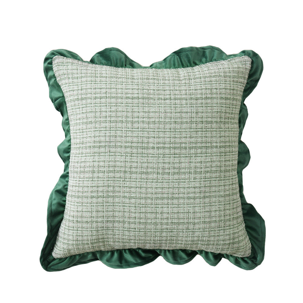 Square decorative pillow with woven linen texture and decorative ruffled edge