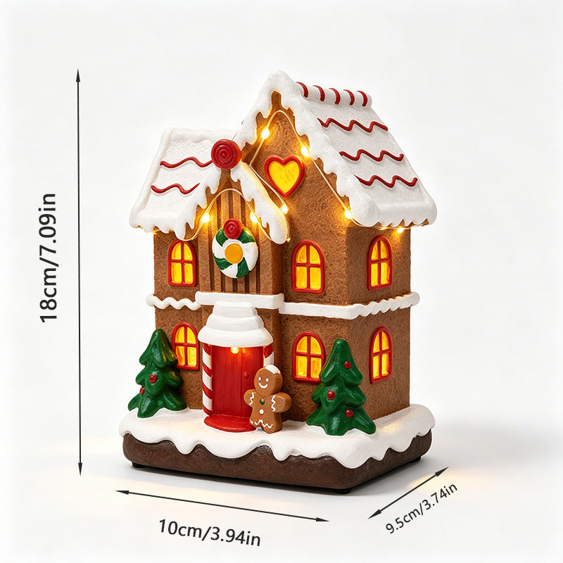 Illuminated Christmas village decoration with moving figures