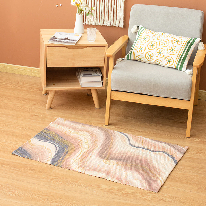 Flat-woven living room rug with marbled pattern and shimmering accent threads