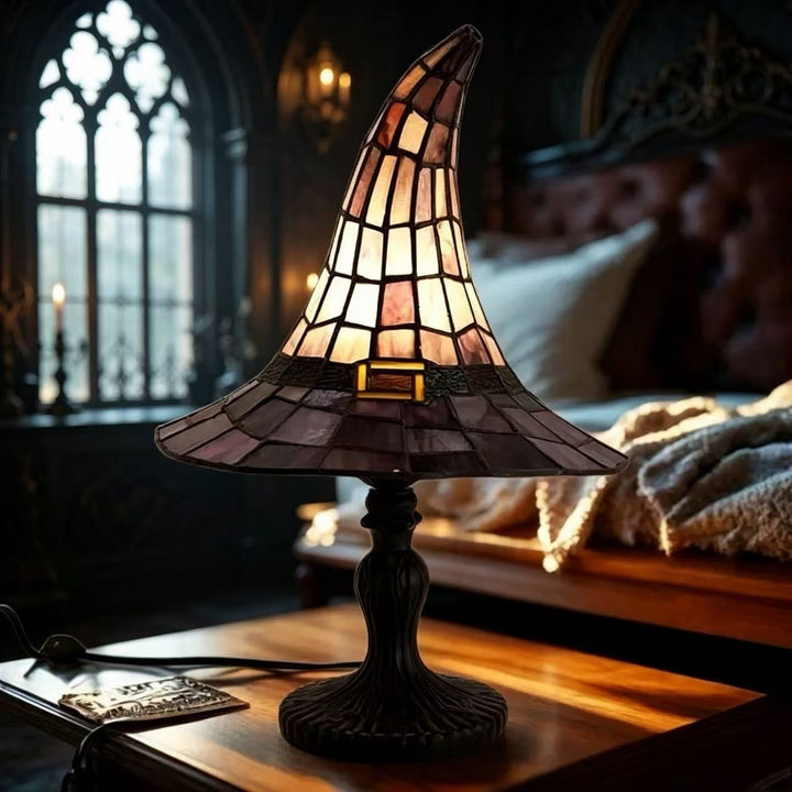 Decorative table lamp in witch hat design
