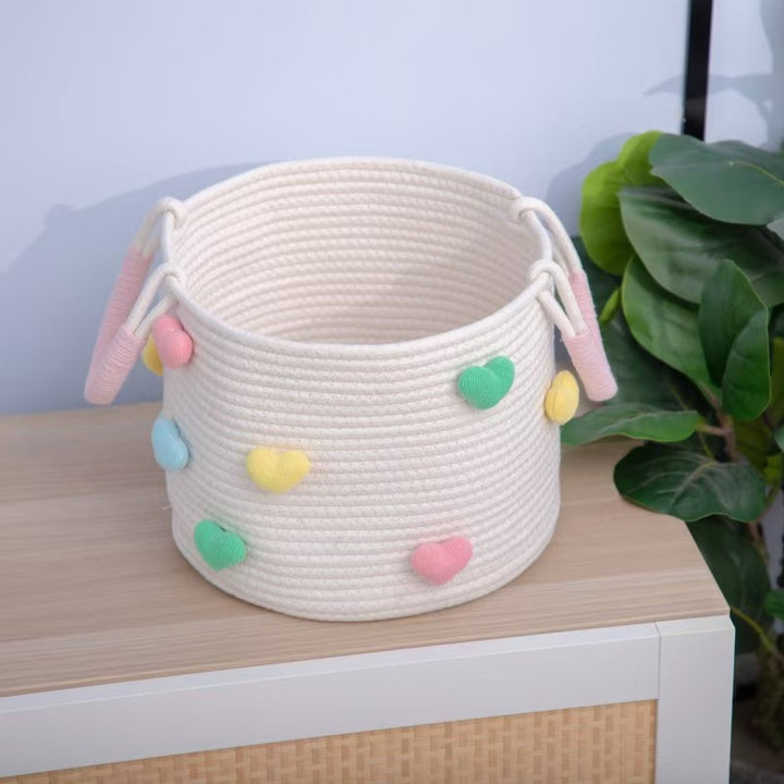 Playful storage basket with heart pattern