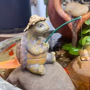 Playful Turtle Fishing Figurine