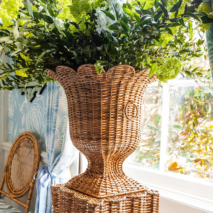 Decorative plant pot stand made of woven material