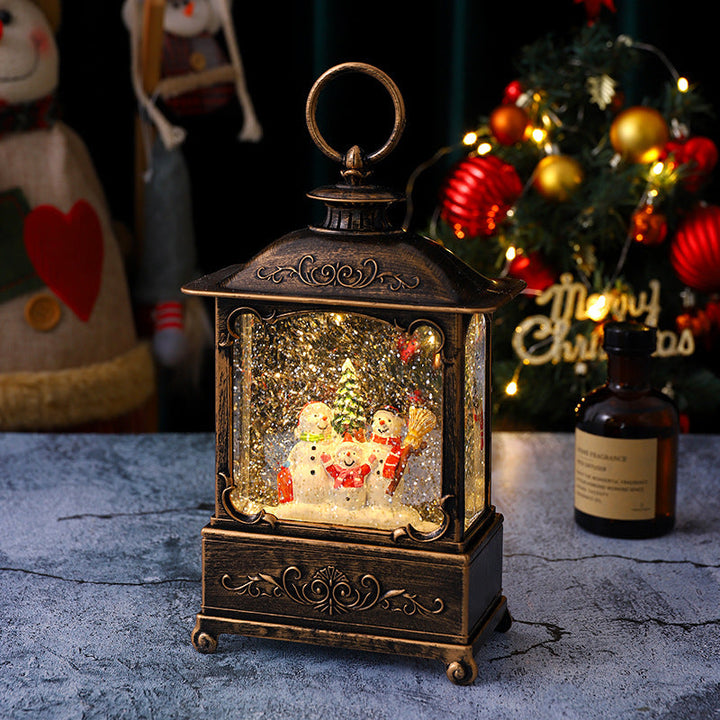 Glittering Christmas lantern with snow scenes