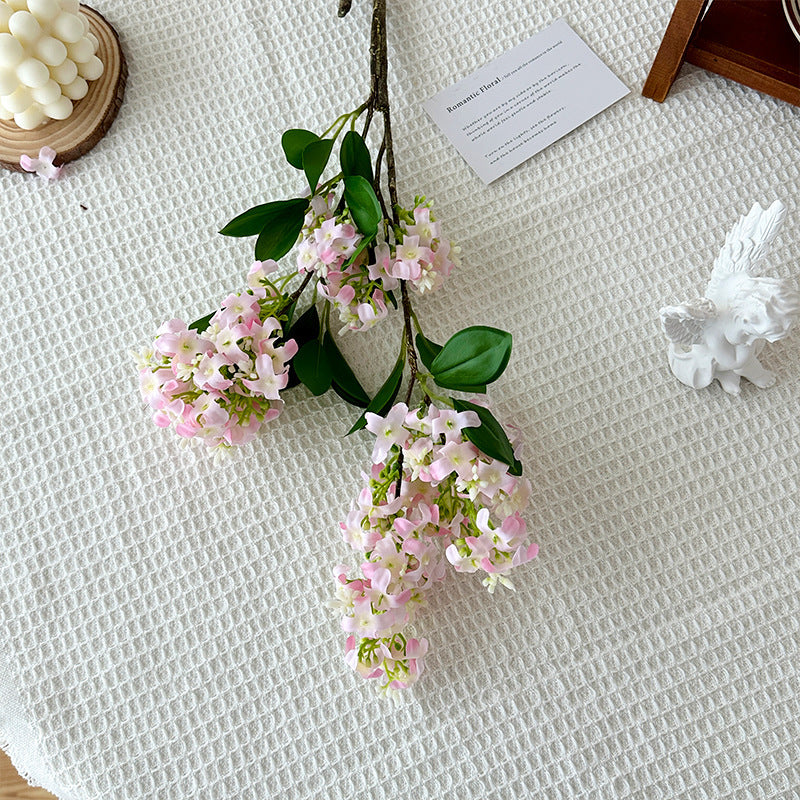 Decorative artificial flower branch