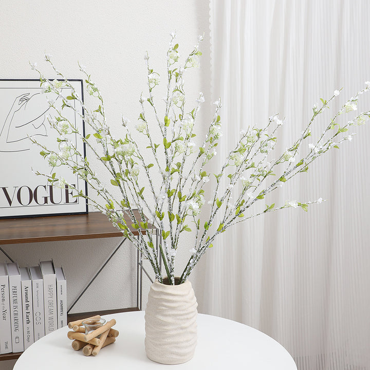Artificial flower branch with detailed flowers