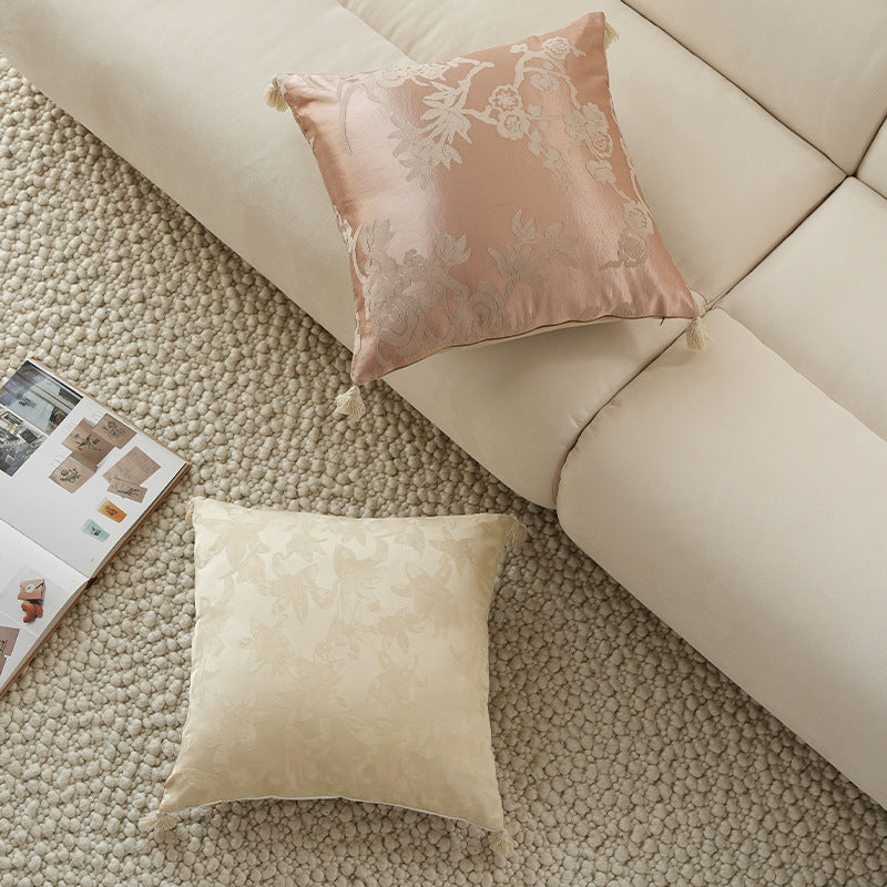 Square jacquard cushion cover made of satin with floral relief texture and tassels