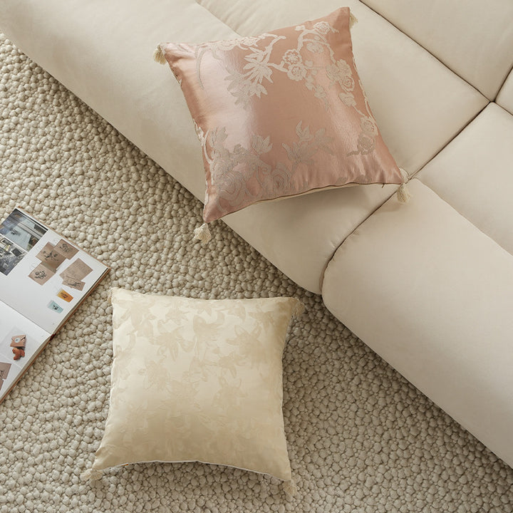 Square jacquard cushion cover made of satin with floral relief texture and tassels