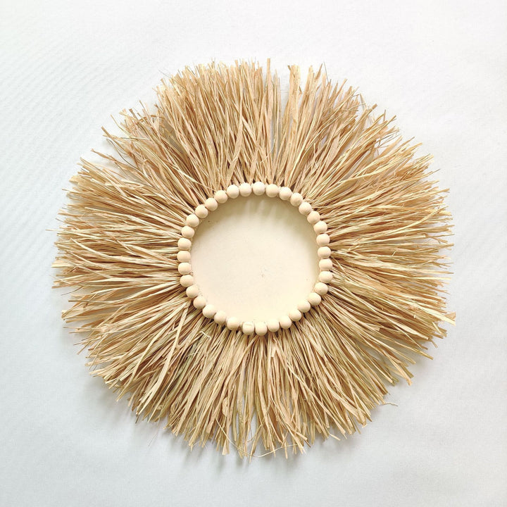 Decorative wall decoration with synthetic fiber and wooden beads