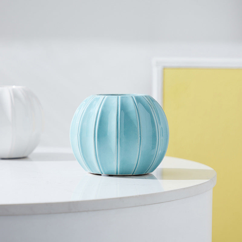Decorative ceramic vase with modern ribbed design