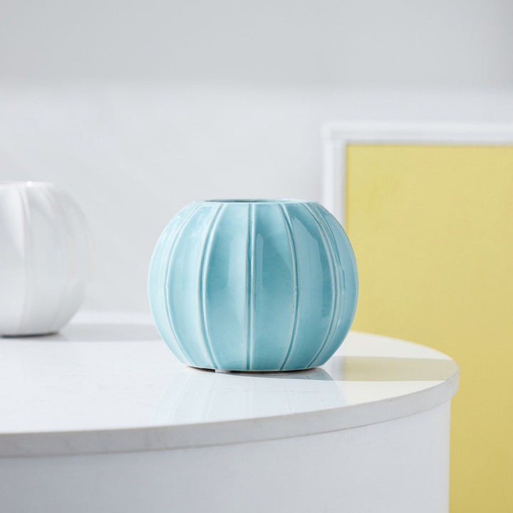 Decorative ceramic vase with modern ribbed design