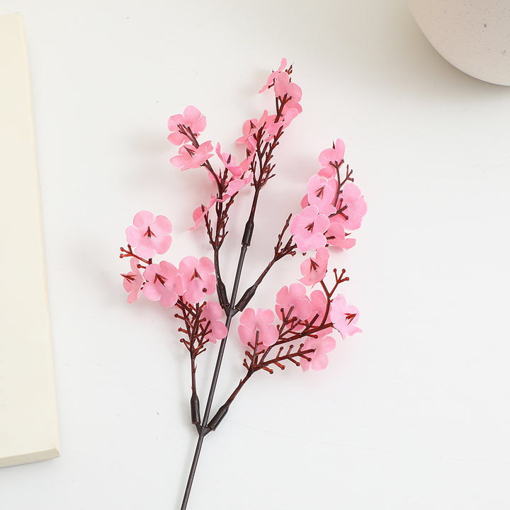 Decorative artificial flower branch