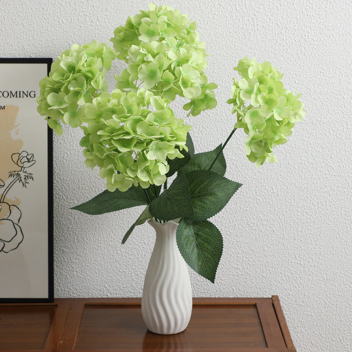 Decorative artificial flower arrangement