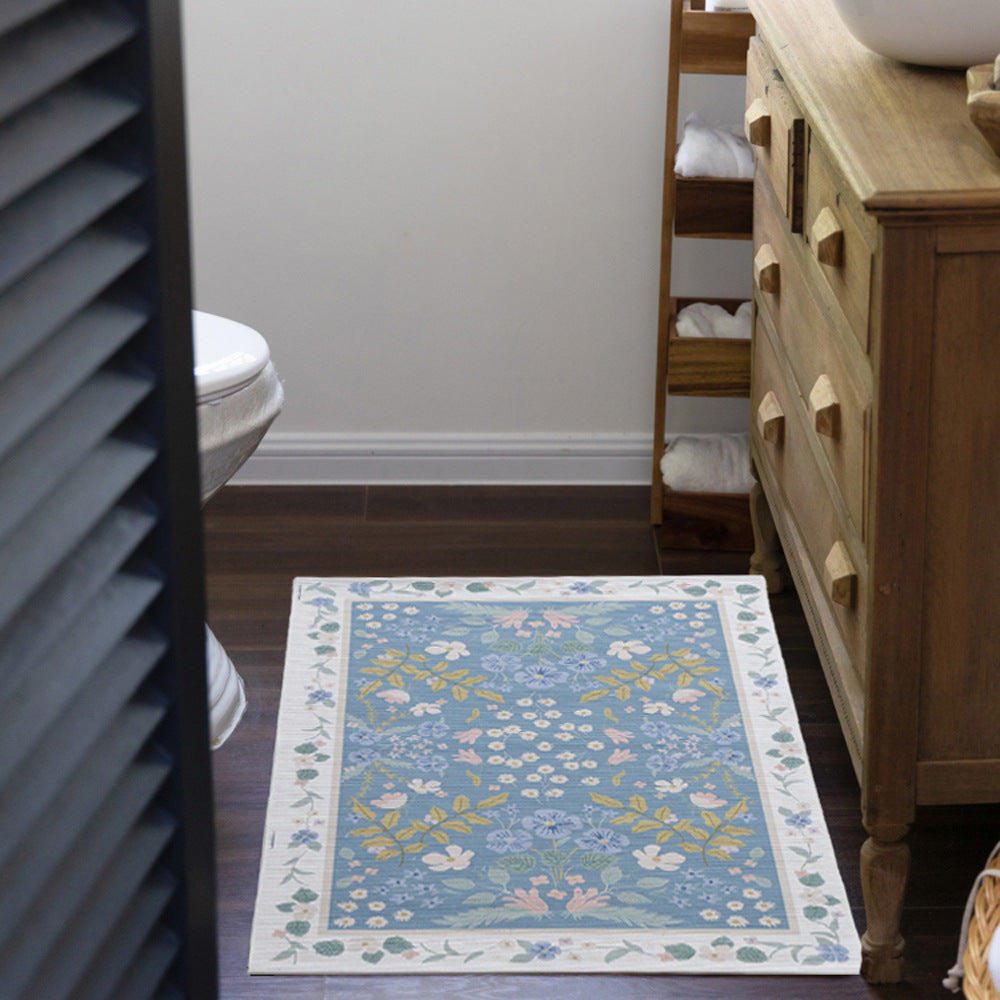 Woven cotton bath mat with floral allover jacquard pattern