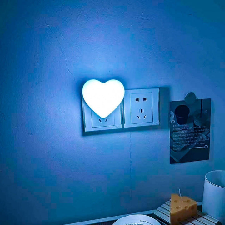 Heart-shaped plug-in ambient night light with soft LED lighting