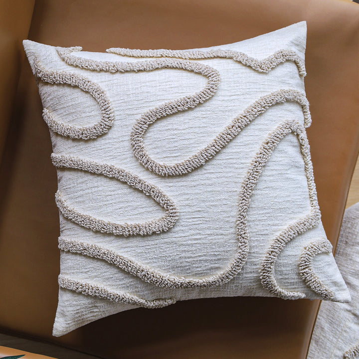 Square decorative cushion cover with hand-tufted loop appliqué and fine linen look