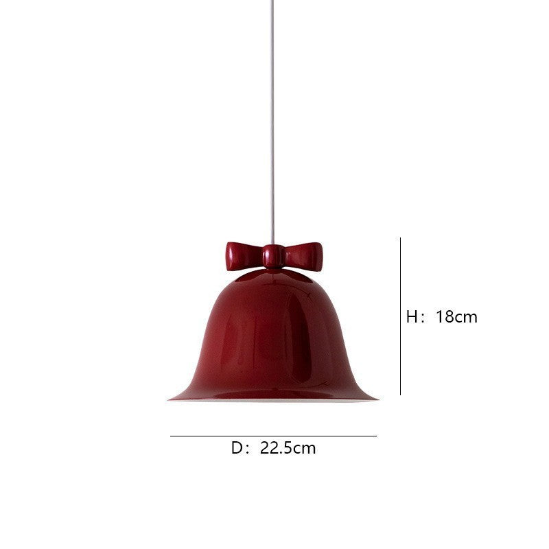 Bell-shaped glass pendant lamp with decorative bow accent