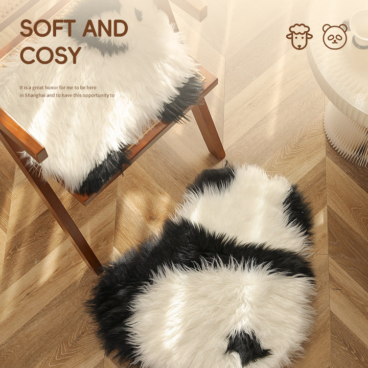 Plush seat pouf in sheep shape with cuddly faux fur cover