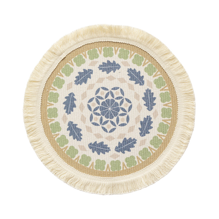 Round handmade woven decorative rug with fringes and botanical pattern
