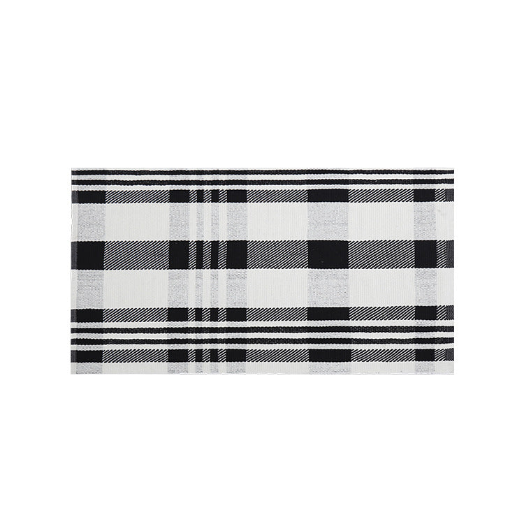 Woven cotton blend bath mat in buffalo check with flat weave structure