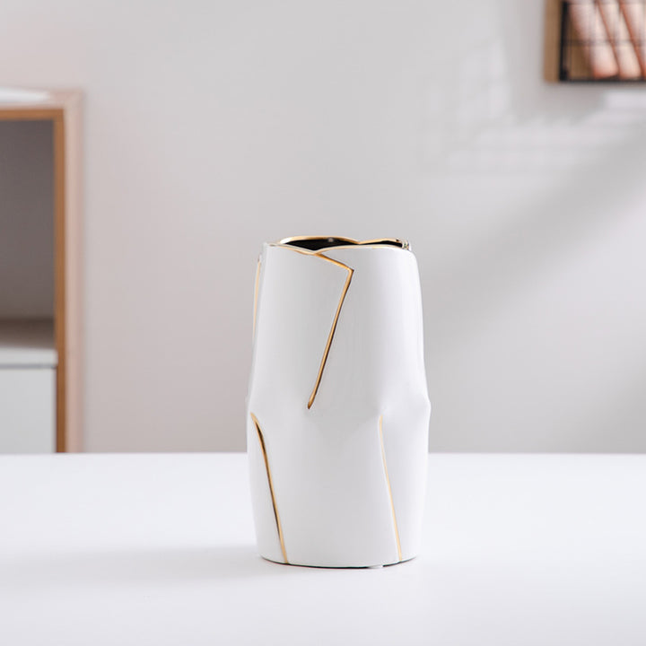 Decorative ceramic vase with golden accents