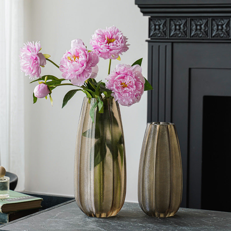 Decorative glass vase with ribbed structure