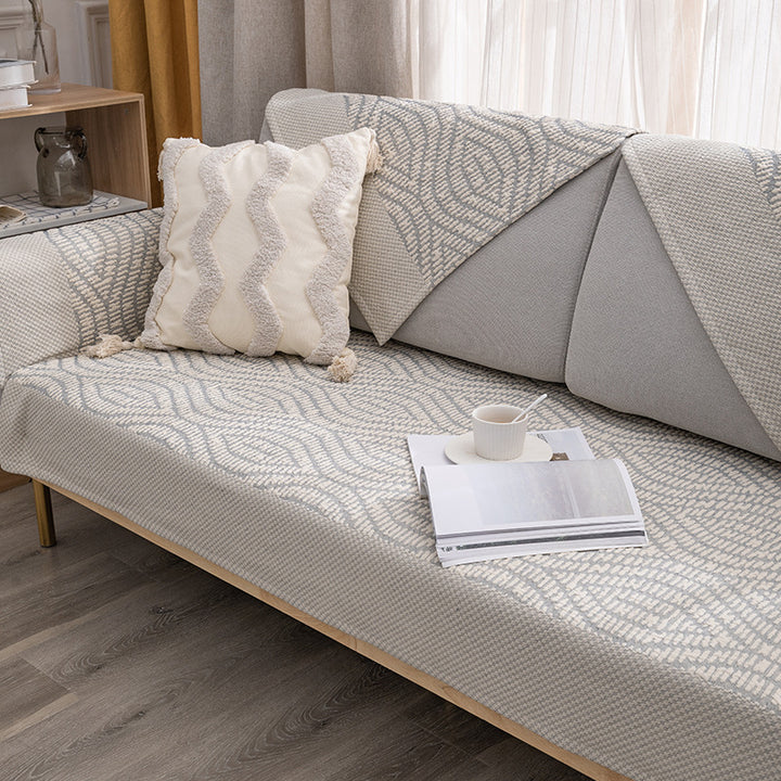 Quilted cover for sofa with armrest protectors and non-slip underside